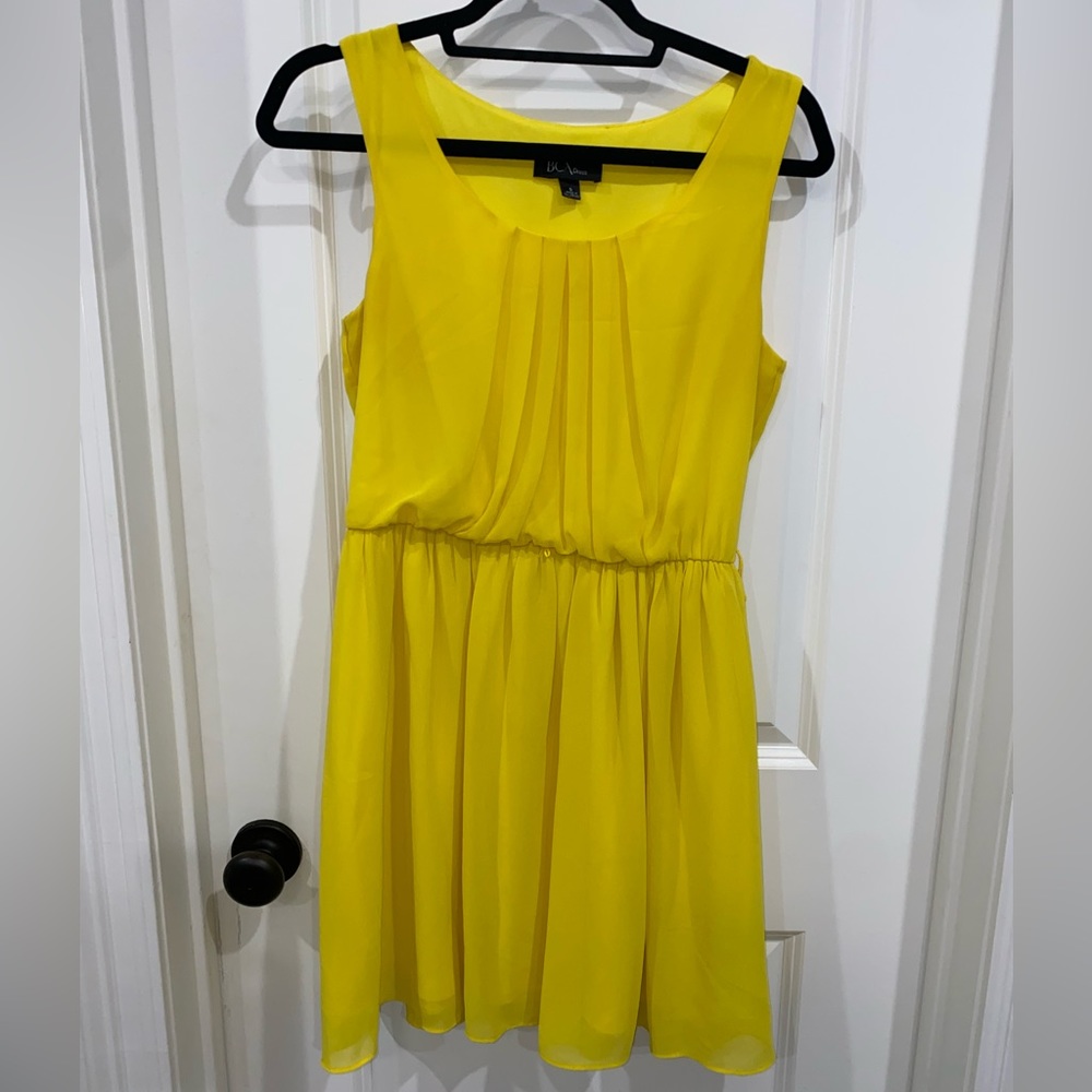 Bright yellow knee length dress